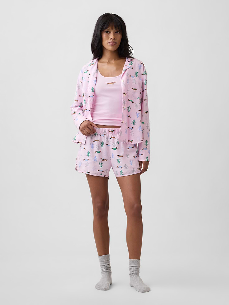 Image 1 of 4, Smooth flannel sleep shorts., Elasticized waist., Slits at dolphin hem., Select styles have allover print, stripes, or plaid., Shop matching PJs for all., This product was made in a factory that invests in gender equity and women’s empowerment through RISE. Learn more at, Product #1184092