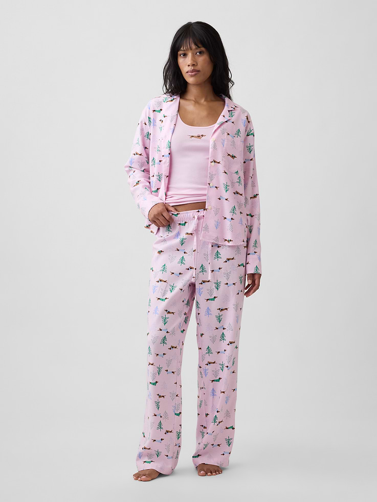 Image 1 of 4, Smooth flannel sleep pants., Drawcord ties at elasticized waist., Select styles have allover print or stripes., Shop matching PJs for all., This product was made in a factory that invests in gender equity and women’s empowerment through RISE. Learn more at, Product #1178604