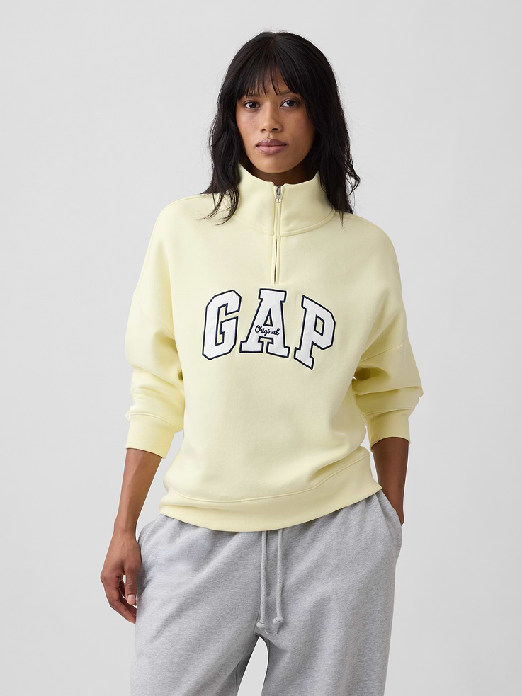 Image 1 of 5, This product is made with/contains 23% recycled polyester. Compared to virgin materials, using recycled materials helps reduce resource use and waste., Soft, comfy fleece., Dropped shoulder, long sleeves with banded cuffs., Mockneck, half-zip front., Gap logo at front., Banded hem., Product #1195242