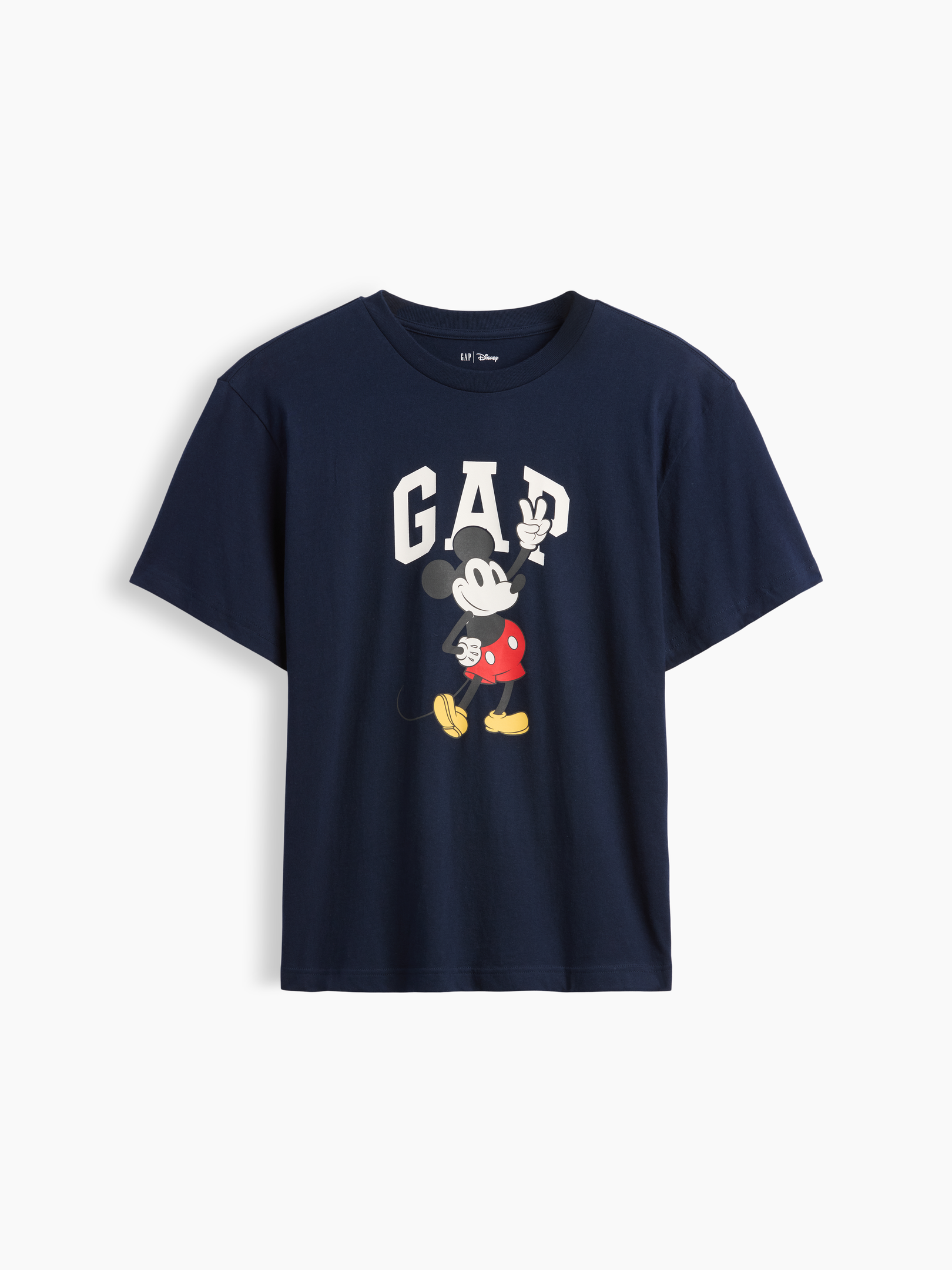 Image 1 of 3, A very special collaboration between Gap and Disney— two timeless, iconic American brands— led us to create a collection that celebrates Mickey Mouse and Minnie Mouse., Soft jersey knit., Dropped shoulder, short sleeves., Crewneck., Gap logo with graphic at front., Product #1180048