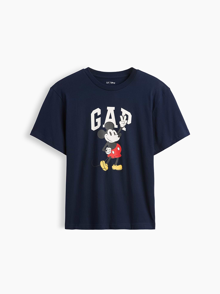 Image 1 of 3, A very special collaboration between Gap and Disney— two timeless, iconic American brands— led us to create a collection that celebrates Mickey Mouse and Minnie Mouse., Soft jersey knit., Dropped shoulder, short sleeves., Crewneck., Gap logo with graphic at front., Product #1180048