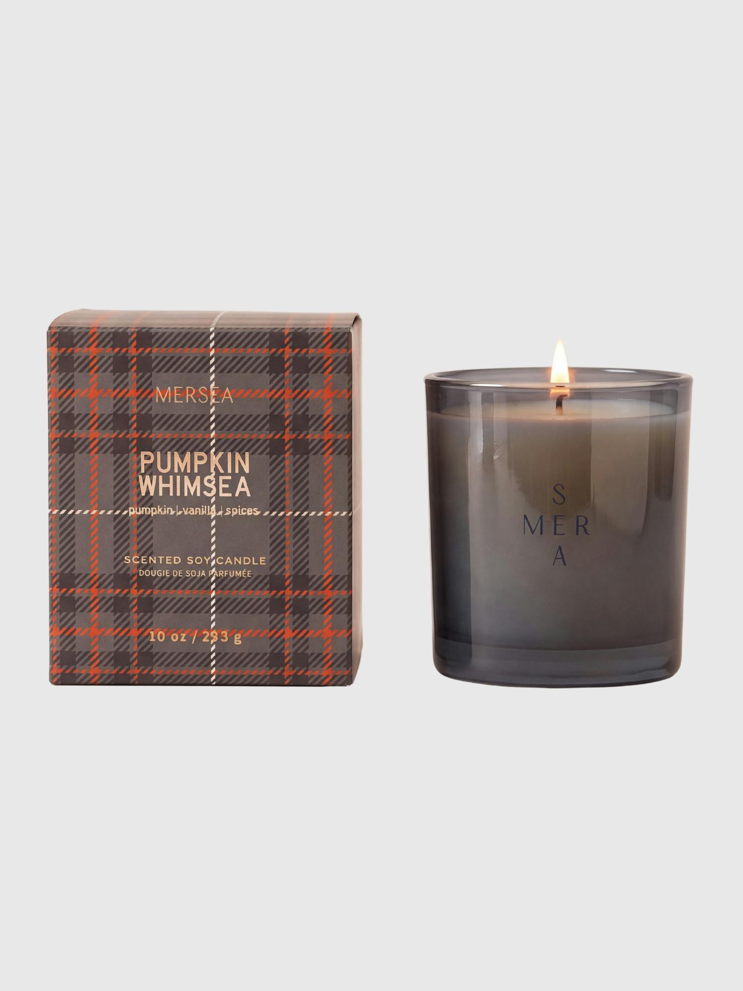 Image 1 of 1, Pumpkin, Vanilla, Spices., A warm welcome back to a favorite seasonal scent, Pumpkin Whimsea., This warm and inviting fragrance will make you want to stay in fall forever., The rich and earthy scent of pumpkin is sweetened with notes of vanilla and balanced out with a touch of spice., This is the subtle, warming autumn scent you’ve been waiting for., Now poured in matching colored glass, this sleek holiday candle comes wrapped in a soft-touch plaid box., It’s the ultimate gifting two-fer: a box so stylish it basically wraps itself, and a gorgeous candle inside that smells every bit as good as it looks.