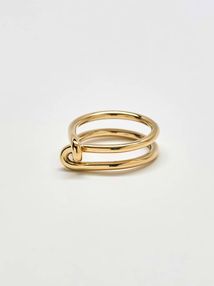 Image 1 of 3, Your ring game just got stronger with this gold statement ring, featuring a double knot design., Closed band., Medium weight., Material: gold plated over stainless steel., Nickel Free, Tarnish Resistant, Admiral Row takes pride in producing high-quality, handmade jewelry using only the best materials at affordable prices.