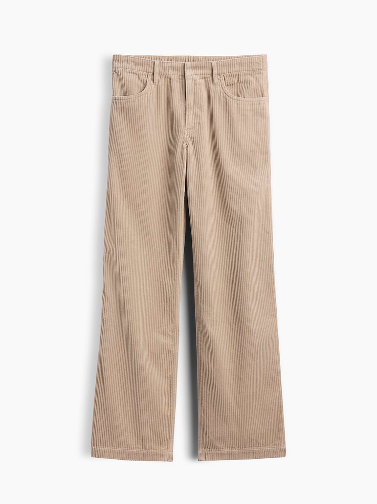 Image 1 of 2, Fit: A full-length loose pant that's fitted on the waist & relaxed all the way down., Fabric: 100% Cotton., Stretch: No Stretch Pants., Rise: Low Rise Pants., Look: A classic, loose jean in corduroy., Details: Zip fly, hook and bar closure, elasticized back waist, front scoop pockets & back patch pockets., This product was made in a factory that invests in gender equity and women’s empowerment through RISE. Learn more at gapinc.com/equity ., Product #1184739