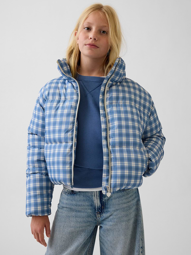 Image 1 of 5, Water-and-wind repellant midweight puffer jacket. In an oversized, slightly cropped fit., Soft sherpa lining., Mockneck., Long sleeves., Zipper front., Slant pockets., Made with 100% recycled polyester. Compared to virgin materials, using recycled materials helps reduce resource use and waste., This product was made in a factory that invests in gender equity and women’s empowerment through RISE. Learn more at gapinc.com/equity ., Product #1185779