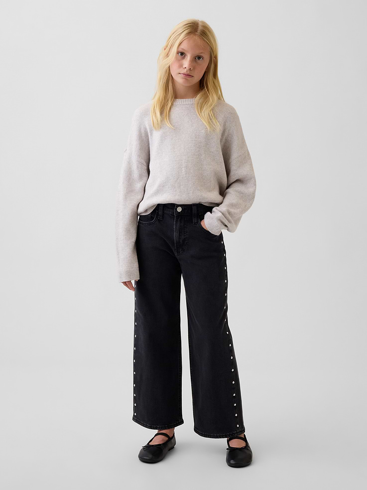 Image 1 of 7, Our born-to-chill loose fit. With a little give and a lot of easy., Low stretch denim jeans., Button at center (sizes 4-8 have a hook & bar closure beneath faux snap for easy on and off), zip fly., Classic 5-pocket styling., Stud detailing at side seams., Responsibly Made: This pair of jeans is part of our water-saving Washwell program. Compared with conventional wash methods, Washwell uses at least 20% less water., More Sustainable Cotton: Made with 5% recycled cotton. Compared to virgin materials, using recycled materials helps reduce resource use and waste., This product was made in a factory that invests in gender equity and women’s empowerment through RISE. Learn more at gapinc.com/equity ., Product #1185393