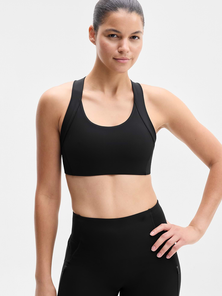 Image 1 of 4, BEST FOR CARDIO: run + train + HIIT, IMPACT: Medium-impact workouts, best for A-C cups, FEEL: PowerMove fabric is sleek, weightless, and helps keep you cool with quick-drying properties, FAVE: Back mesh detail offers optimal breathability, Built-in pockets with removable pads for optional coverage, Product #1178724