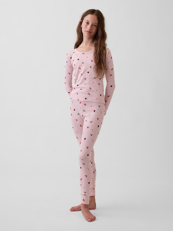 Image 1 of 2, Our comfiest PJs—now softer than ever. Cozy brushed cotton on the inside. All their favorite prints & colors on the outside., Soft cotton jersey pajama top and pants PJ set with a cozy brushed interior., Crewneck., Long sleeves., Elasticized waist at PJ pants., Banded cuffs., Allover print., Made with 100% organically grown cotton which is grown without the use of synthetic pesticides and fertilizers., Shop matching PJs for all., This product was made in a factory that invests in gender equity and women’s empowerment through RISE. Learn more at gapinc.com/equity ., Product #915891
