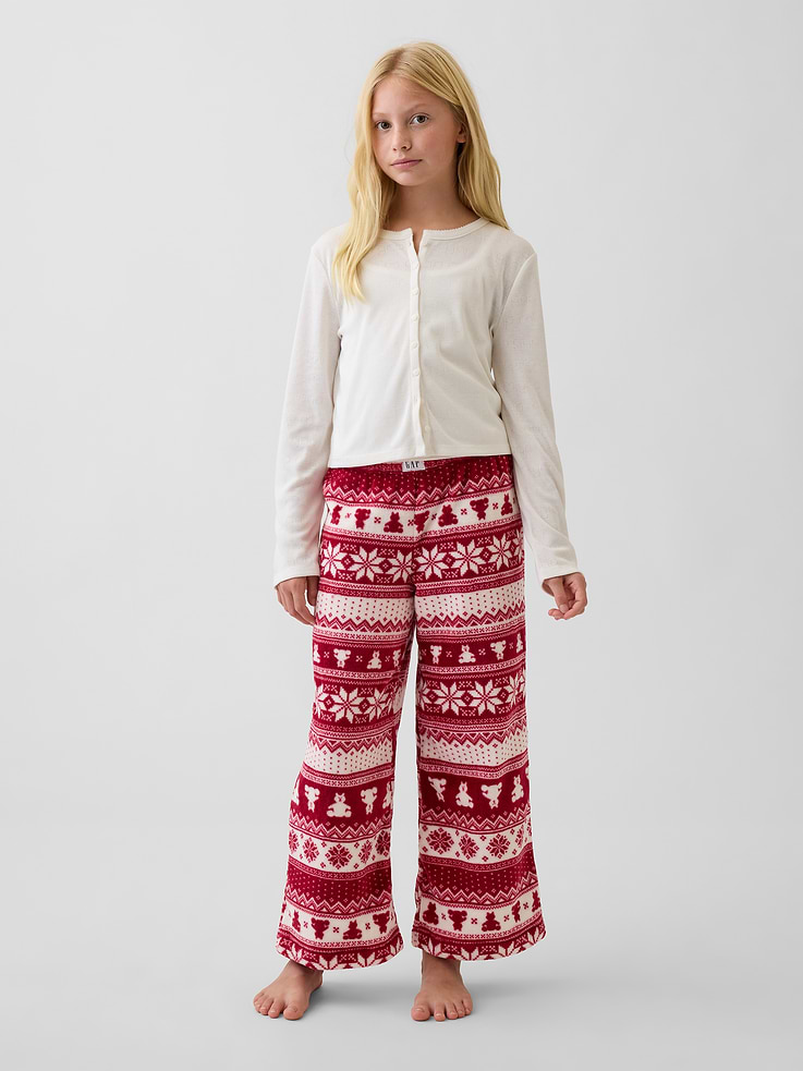 Image 1 of 5, Soft, cozy knit pajama pants., Elasticized waist with Gap logo patch., Allover print., Made with 100% recycled polyester. Compared to virgin materials, using recycled materials helps reduce resource use and waste., Shop matching PJs for all., This product was made in a factory that invests in gender equity and women’s empowerment through RISE. Learn more at gapinc.com/equity ., Product #915904