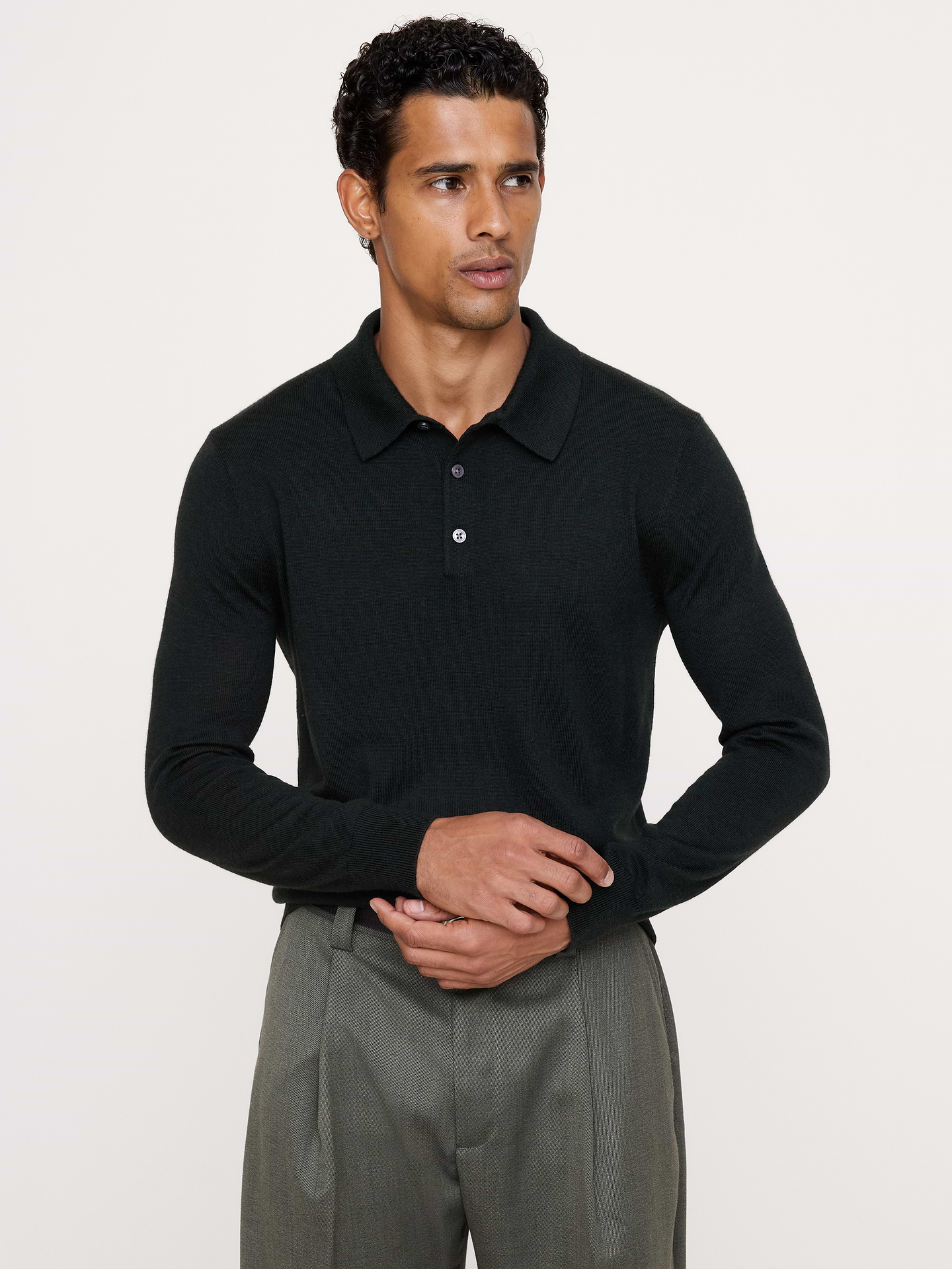 Image 1 of 5, Looks good, feels good. A timeless polo, crafted in beautifully warm and soft Merino wool., Standard fit: A straight and easy fit., Polo collar with button placket., Straight hem., Product #914161