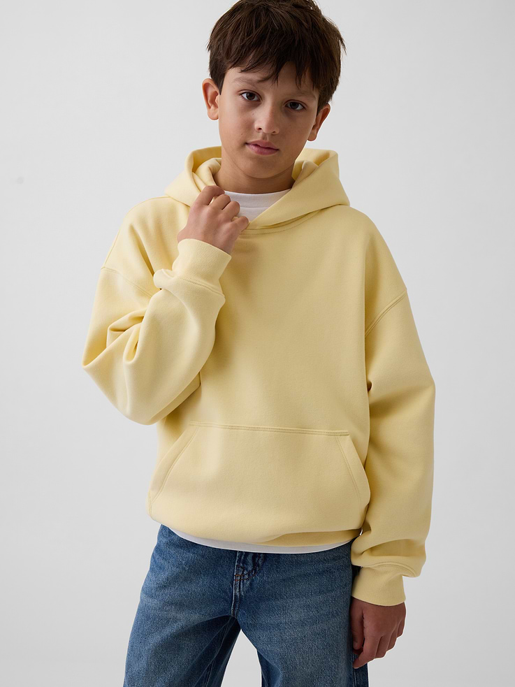 Image 1 of 5, Our softer than soft sweats. Brushed on the inside. Smooth on the outside. Made so that no two are alike., Soft cotton-blend fleece pullover hoodie. In a relaxed fit., Hooded neckline., Long sleeves with drop shoulders., Kanga pocket., Banded rib cuffs and hem., Made with 52% Protocol cotton verified by the U.S. Cotton Trust Protocol, a program which works with farms committed to improving their environmental footprint by minimizing water usage and improving soil health (Claim No. 10127)., Made with 23% recycled polyester. Compared to virgin materials, using recycled materials helps reduce resource use and waste., This product was made in a factory that invests in gender equity and women’s empowerment through RISE. Learn more at gapinc.com/equity ., Product #1184272