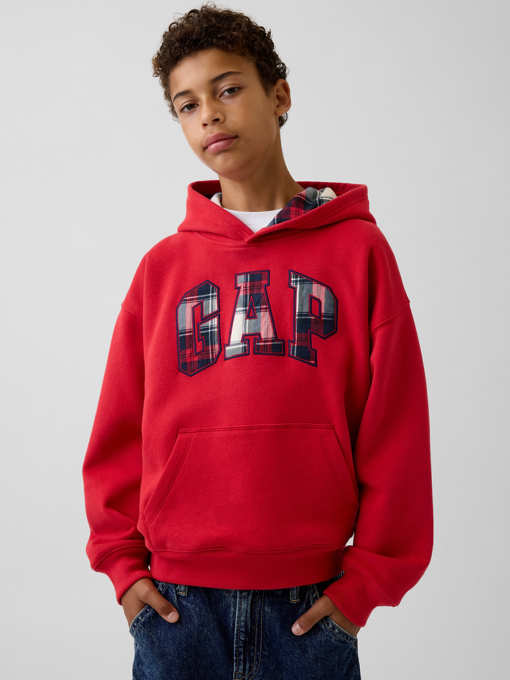 Image 1 of 5, Our softer than soft sweats. Brushed on the inside. Smooth on the outside. Made so that no two are alike., Soft cotton-blend fleece pullover hoodie. In a relaxed fit., Hooded neckline., Long sleeves with drop shoulders., Gap arch logo at front., Kanga pocket., Banded rib cuffs and hem., Made with 52% Protocol cotton verified by the U.S. Cotton Trust Protocol, a program which works with farms committed to improving their environmental footprint by minimizing water usage and improving soil health (Claim No. 10127)., Made with 23% recycled polyester. Compared to virgin materials, using recycled materials helps reduce resource use and waste., This product was made in a factory that invests in gender equity and women’s empowerment through RISE. Learn more at gapinc.com/equity ., Product #1184268