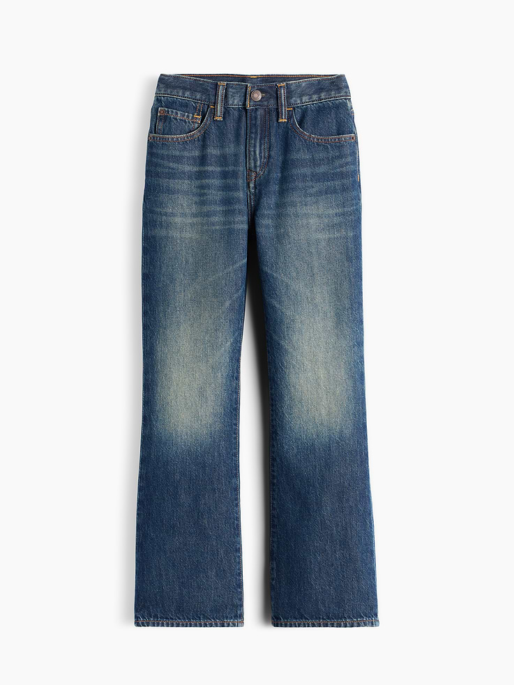 Image 1 of 3, Authentic, non-stretch denim relaxed boot jeans., Button closure at adjustable waist (sizes 4-8 have a hook & bar closure beneath faux snap for easy on and off), zip fly., Classic five-pocket styling., Dark wash., Responsibly Made: This pair of jeans is part of our water-saving Washwell program. Compared with conventional wash methods, Washwell uses at least 20% less water., Made with 52% Protocol cotton verified by the U.S. Cotton Trust Protocol, a program which works with farms committed to improving their environmental footprint by minimizing water usage and improving soil health (Claim No. 10127)., Made with 5% recycled cotton. Compared to virgin materials, using recycled materials helps reduce resource use and waste., This product was made in a factory that invests in gender equity and women’s empowerment through RISE. Learn more at gapinc.com/equity ., Product #1183561