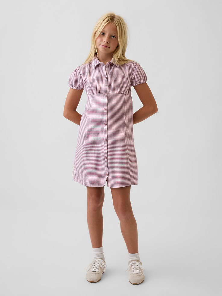 Image 1 of 5, Smooth stretch cotton shirtdress., Spread collar, button front., Cap sleeves with elasticized cuffs., Shirring at empire waist seam., Seaming detail at front and back., Allover gingham print., Product #912168