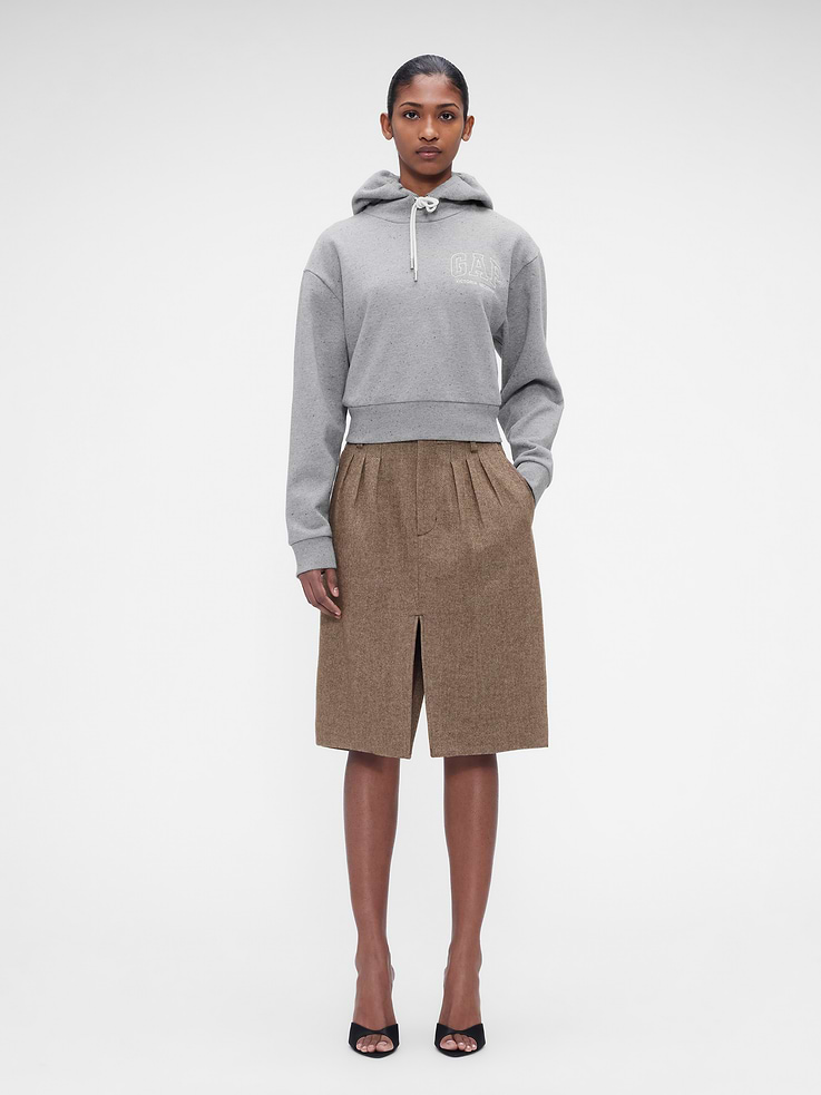 Image 1 of 7, Herringbone wool-blend skirt. In classic column silhouette., Hook and bar closure, zip fly., Slant pockets., Pleating at front., Split hem at front and back., Made with 30% recycled wool, 68% recycled polyester. Compared to virgin materials, using recycled materials helps reduce resource use and waste., Product #1183571