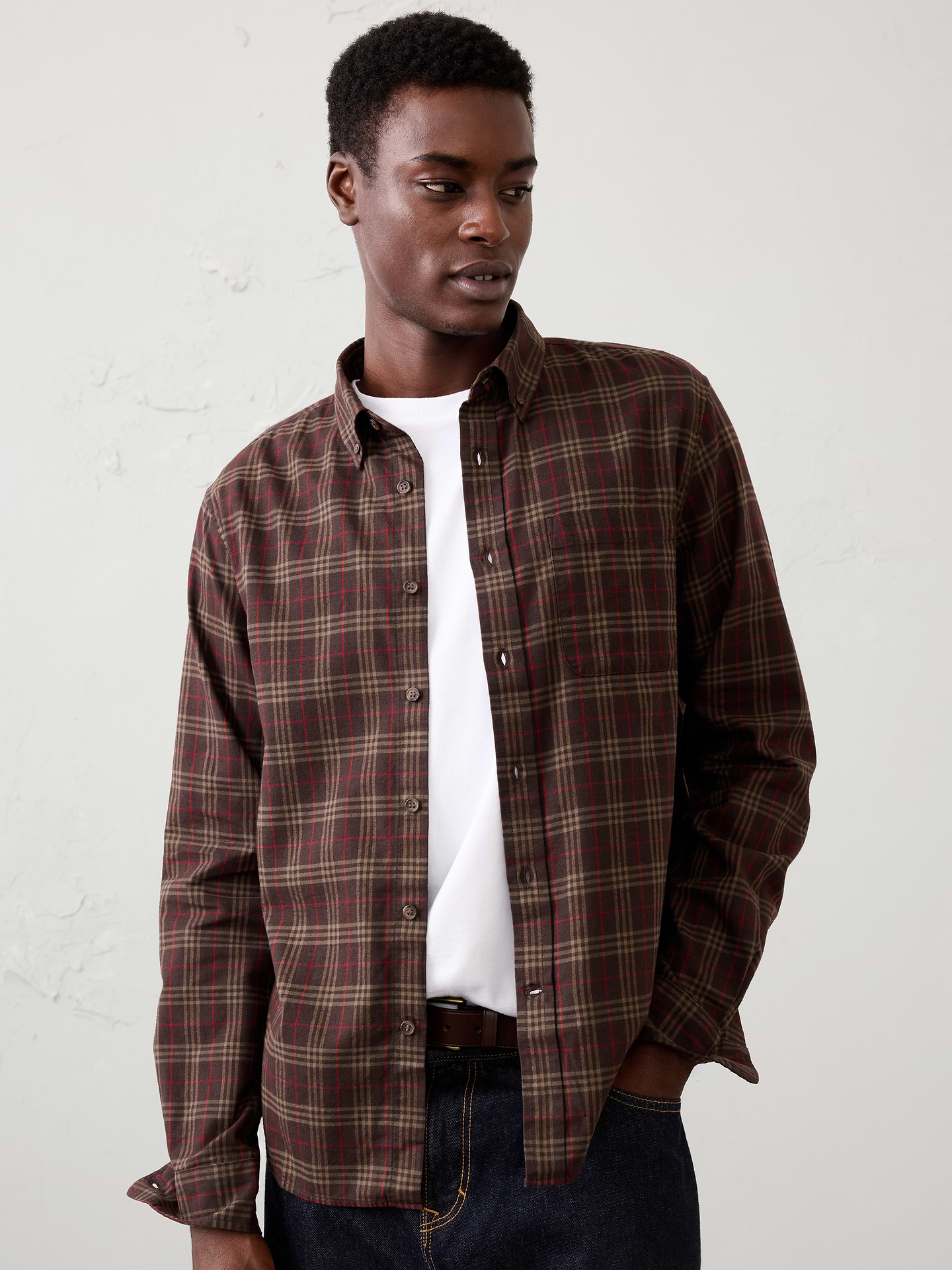 Image 1 of 7, A lightweight flannel designed for seasonal transitions, offering the softness and classic pattern of traditional flannel without the bulk. Easy to layer and versatile across a range of everyday looks., UNTUCKED: Designed with a shorter hemline to hit right at the hips., Button down collar. Long sleeves with adjustable double-button barrel cuffs and button vents., Button‑front closure., Chest pocket., Back yoke., Shirttail hem., Made exclusively for Banana Republic Factory., Product #1175888