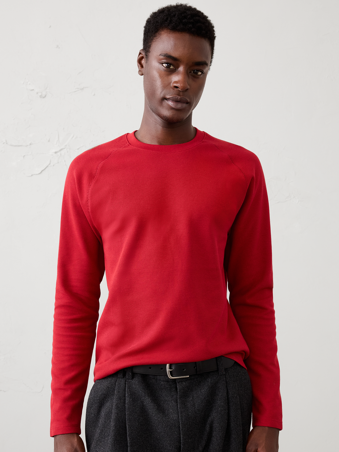 Image 1 of 8, We've updated our waffle fabric with a more traditional, heritage‑inspired waffle stitch and a cotton‑rich blend for enhanced comfort and timeless appeal. The richly textured knit offers breathable warmth and a substantial feel, making it an easy everyday layer that combines classic style with modern comfort., Crew neck. Long sleeves., Ribbed collar., Made exclusively for Banana Republic Factory., Product #1176094