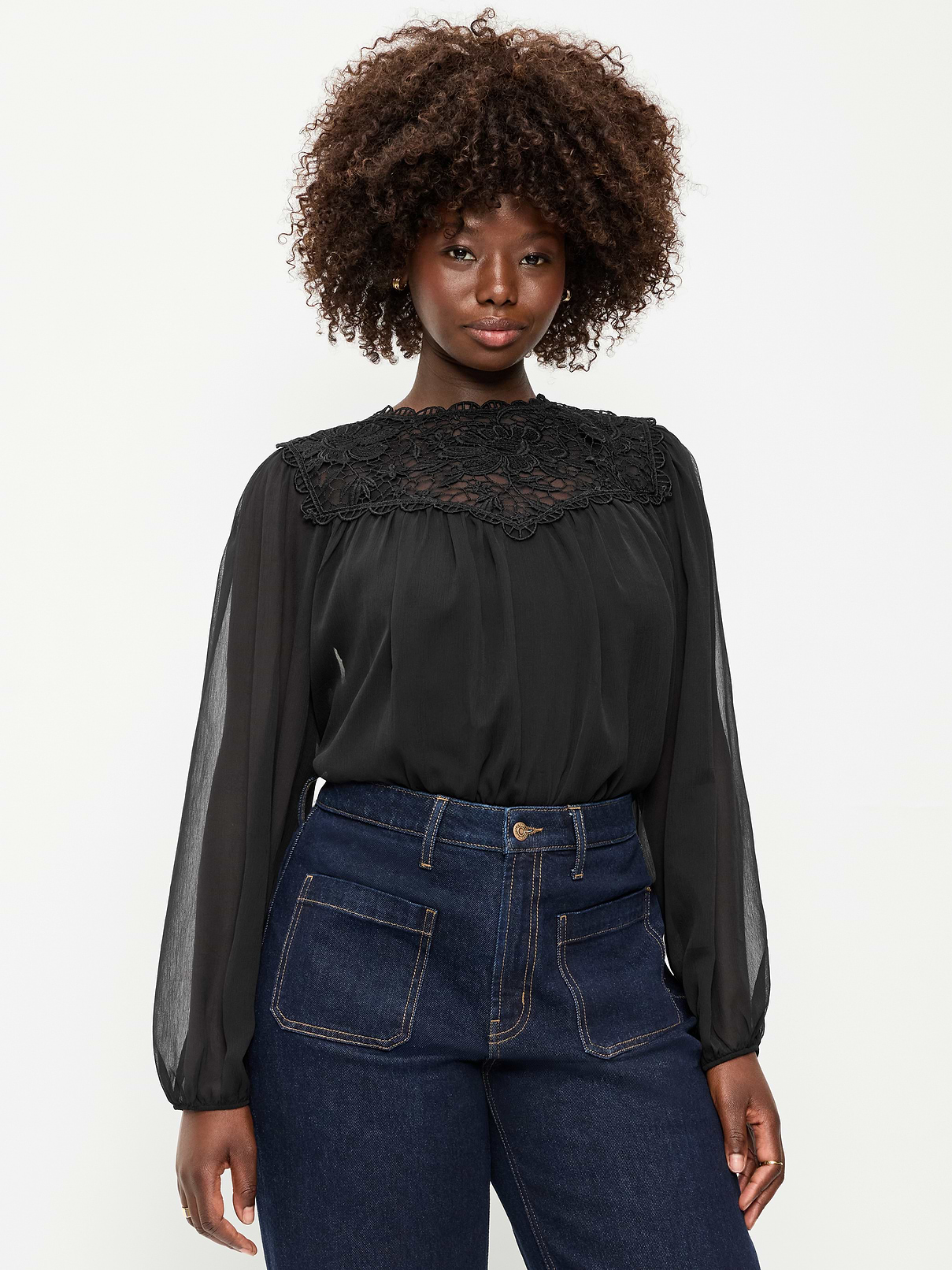 Image 1 of 3, mock neck with lace trim, lace yoke with floral detailing, long sleeves, shirred detailing, keyhole cutout with button closure at back, Product #1184398
