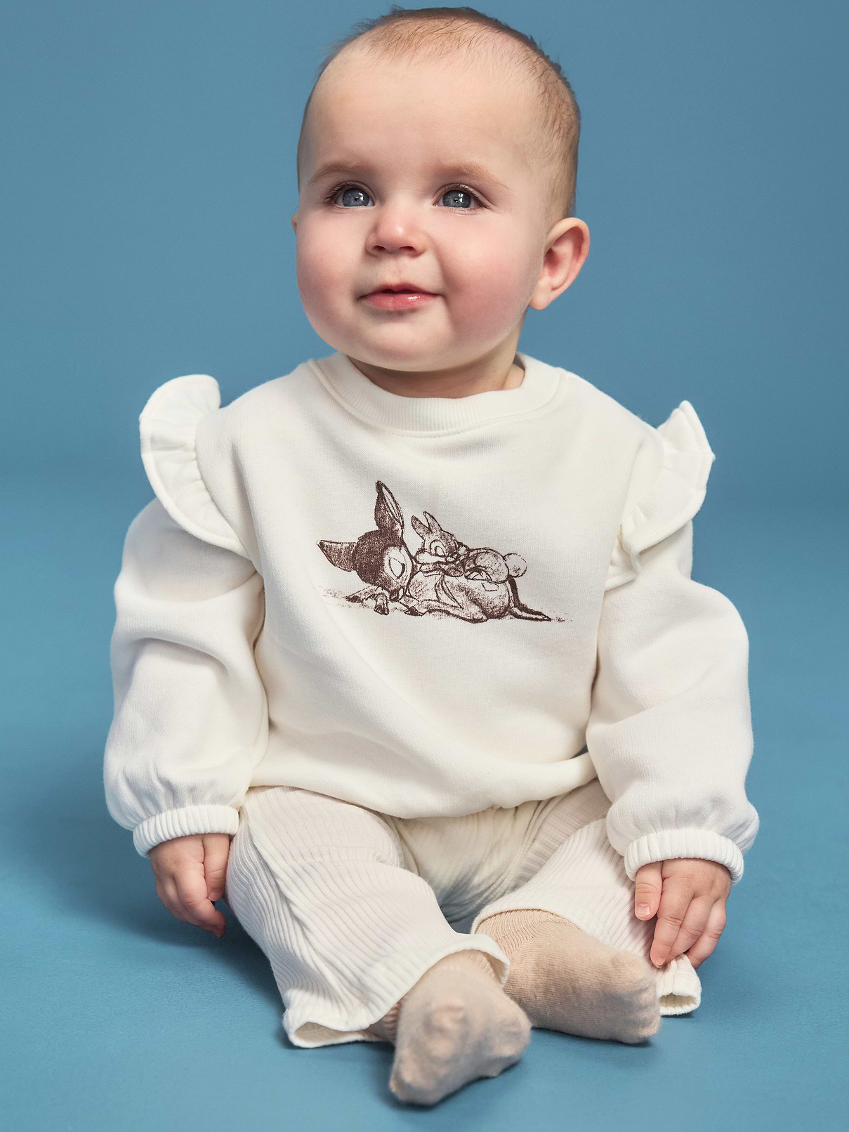 Image 1 of 5, crew neck, snap-button placket at nape, long sleeves, ruffle trim along shoulders, cinched hem, matching leggings, elasticized waistband, licensed graphic, ©Disney, Product #1184366