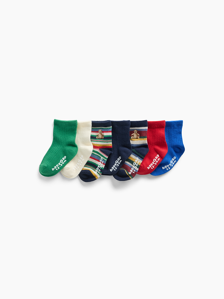 Image 1 of 2, Soft, stretch knit quarter crew socks., Ribbed top., Reinforced toe and heel., This product was made in a factory that invests in gender equity and women’s empowerment through RISE. Learn more at gapinc.com/equity ., Product #1185866