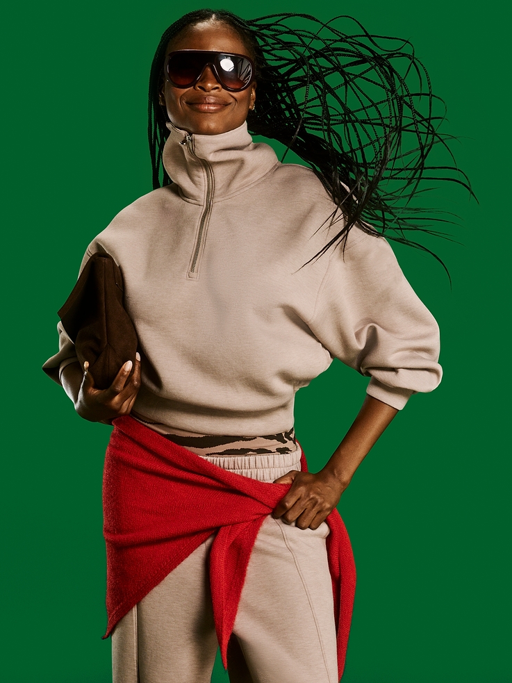 Image 1 of 8, Make your moves in Old Navy Sport's Bounce Fleece: Our signature smooth spacer fabric that keeps its shape., half-zip collar, drop-shoulder sleeves, on-seam pockets, pullover style, 4-way stretch, breathable, Product #583079