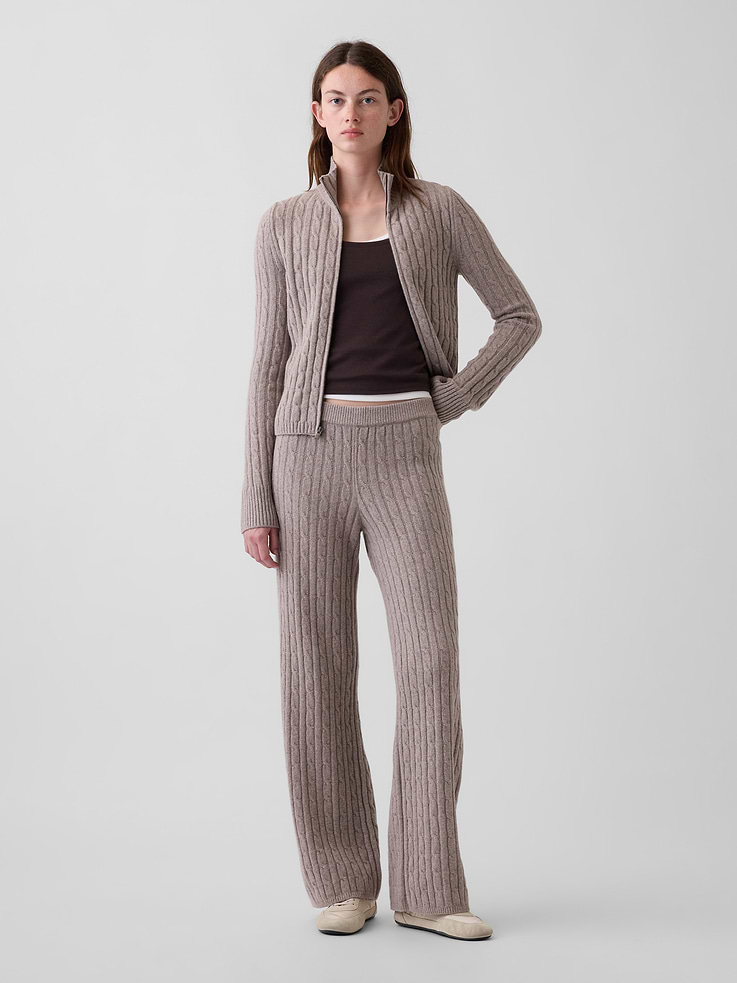 Image 1 of 6, Supersoft cable-knit cotton-blend sweater pants. In a relaxed fit., Elasticized waist., Ribbed hem., This product was made in a factory that invests in gender equity and women’s empowerment through RISE. Learn more at gapinc.com/equity ., Product #1186085