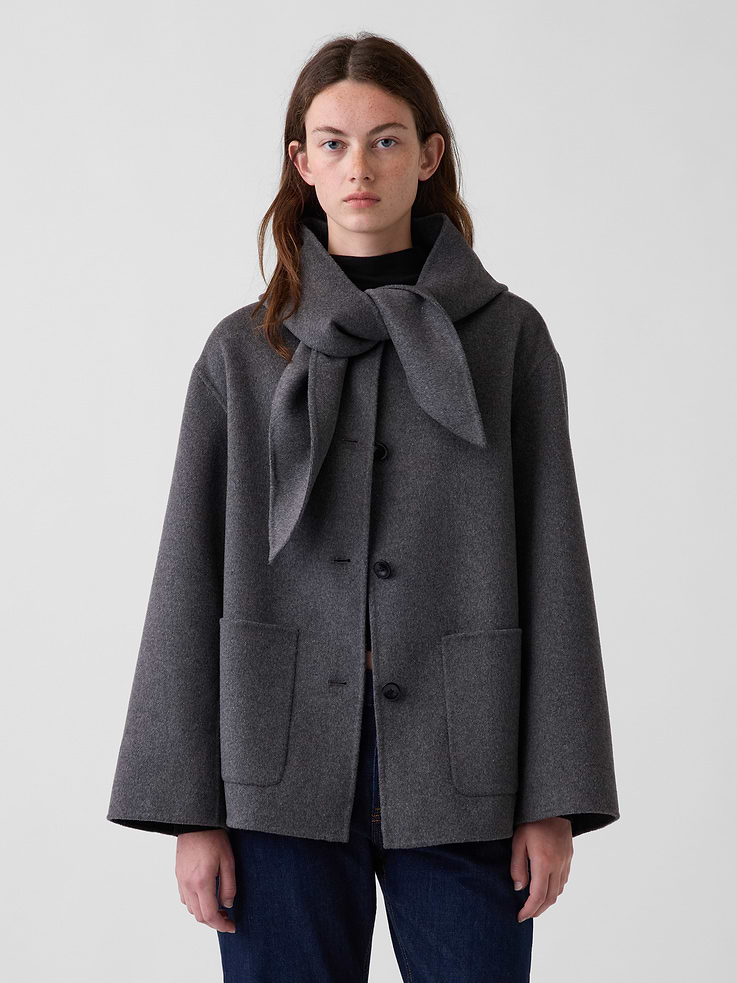Image 1 of 4, Soft wool-blend coat. In a relaxed fit., Hooded tie neck., Long sleeves., Button front., Front patch pockets., Made with 52% recycled wool. Compared to virgin materials, using recycled materials helps reduce resource use and waste., Made with 40% recycled polyester. Compared to virgin materials, using recycled materials helps reduce resource use and waste., This product was made in a factory that invests in gender equity and women’s empowerment through RISE. Learn more at gapinc.com/equity ., Product #1182546