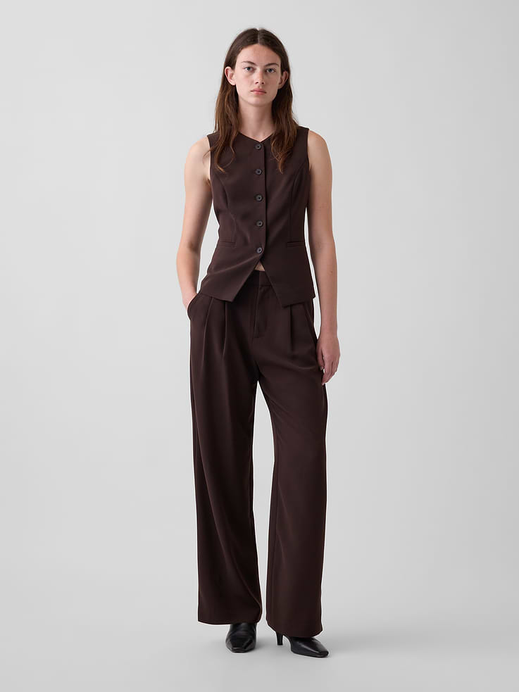 Image 1 of 8, Our soft-structured, effortless essential that works all day, every day. Cut with a high-waist and a drapey feel. Made to dress up, down, whatever., Soft, stretch woven trousers., E-waist with concealed hook and bar closure, zip fly., Front slant pockets, back welt pockets., Pleating at front., Made with 57% recycled polyester. Compared to virgin materials, using recycled materials helps reduce resource use and waste., This product was made in a factory that invests in gender equity and women’s empowerment through RISE. Learn more at gapinc.com/equity ., Product #800532