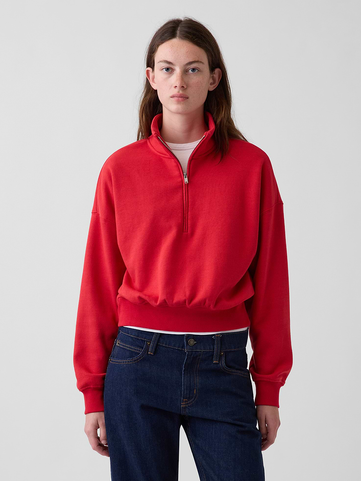 Image 1 of 6, Our softer than soft sweats. Brushed on the inside. Smooth on the outside. Made so that no two are alike., Soft cotton-blend fleece pullover sweatshirt. In an extra oversized and slightly cropped length., Mockneck with half-zip closure., Long sleeves with drop shoulders., Banded cuffs & hem., Made with 23% recycled polyester. Compared to virgin materials, using recycled materials helps reduce resource use and waste., Explore our GapSweats Guide ., Product #903061
