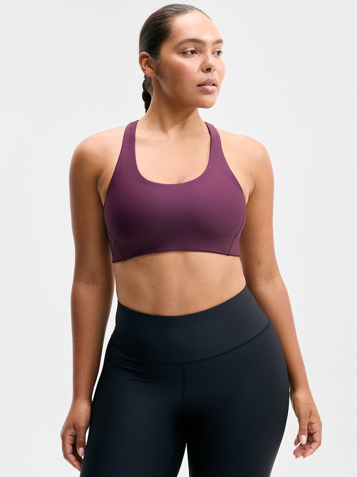 Image 1 of 4, BEST FOR CARDIO: run + train + HIIT, IMPACT: Medium-impact workouts, best for A-C cups, FEEL: PowerMove fabric is sleek, weightless, and helps keep you cool with quick-drying properties, FAVE: Dual cross-back straps and shaping seams for a secure, sculpted fit, Removable pads hold their shape from wash to wear, Lined with PowerMesh for breathable, sweat-proof coverage, Product #864108