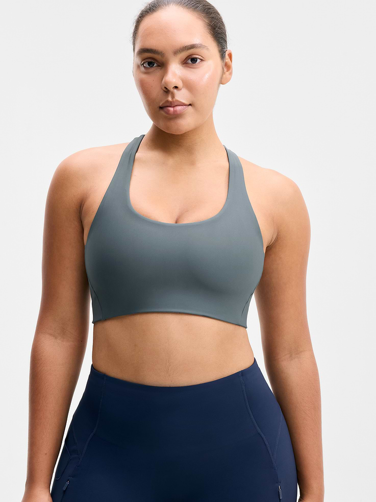 Image 1 of 4, BEST FOR CARDIO: run + train + HIIT, IMPACT: Medium-impact workouts, best for A-C cups, FEEL: PowerMove fabric is sleek, weightless, and helps keep you cool with quick-drying properties, FAVE: Dual cross-back straps and shaping seams for a secure, sculpted fit, Removable pads hold their shape from wash to wear, Lined with PowerMesh for breathable, sweat-proof coverage, Product #864108