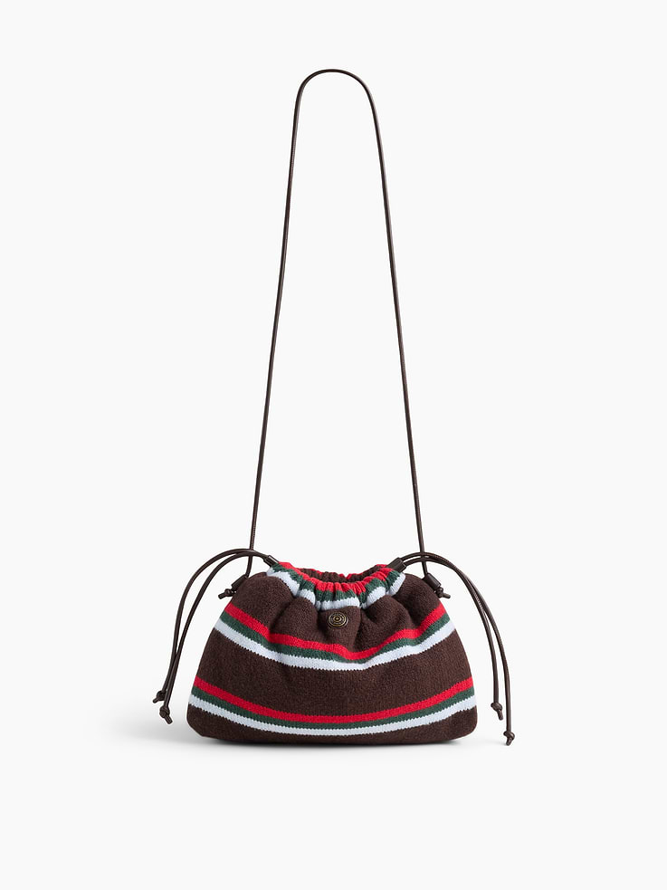 Image 1 of 6, Supersoft pouchette bag., Worn hand-held, crossbody or over-the-shoulder., Vegan leather shoulder strap., Drawcord closure at top., Product #1186131