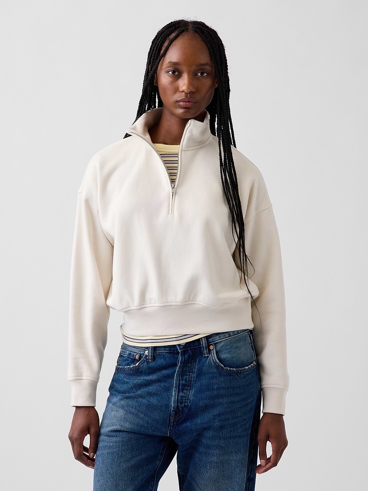 Image 1 of 6, Our softer than soft sweats. Brushed on the inside. Smooth on the outside. Made so that no two are alike., Soft cotton-blend fleece pullover sweatshirt. In an extra oversized and slightly cropped length., Mockneck with half-zip closure., Long sleeves with drop shoulders., Banded cuffs & hem., Made with 23% recycled polyester. Compared to virgin materials, using recycled materials helps reduce resource use and waste., Explore our GapSweats Guide ., Product #903061