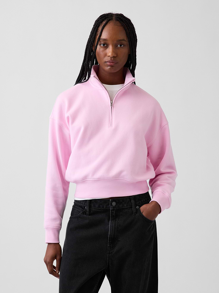Image 1 of 7, Our softer than soft sweats. Brushed on the inside. Smooth on the outside. Made so that no two are alike., Soft cotton-blend fleece pullover sweatshirt. In an extra oversized and slightly cropped length., Mockneck with half-zip closure., Long sleeves with drop shoulders., Banded cuffs & hem., Made with 23% recycled polyester. Compared to virgin materials, using recycled materials helps reduce resource use and waste., Explore our GapSweats Guide ., Product #903061