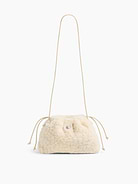 Image 1 of 6, Soft sherpa pouchette bag., Worn hand-held, crossbody or over-the-shoulder., Vegan leather shoulder strap., Drawcord closure at top., Product #1186132