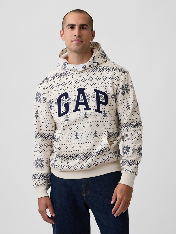 Image 1 of 4, This product is made with/contains 23% recycled polyester. Compared to virgin materials, using recycled materials helps reduce resource use and waste, Soft, comfy fleece., Dropped shoulder, long sleeves with banded cuffs., Hood., Gap logo at front., Kanga pocket., Banded hem., Select styles have allover print., This product was made in a factory that invests in gender equity and women’s empowerment through RISE. Learn more at, Product #1186975