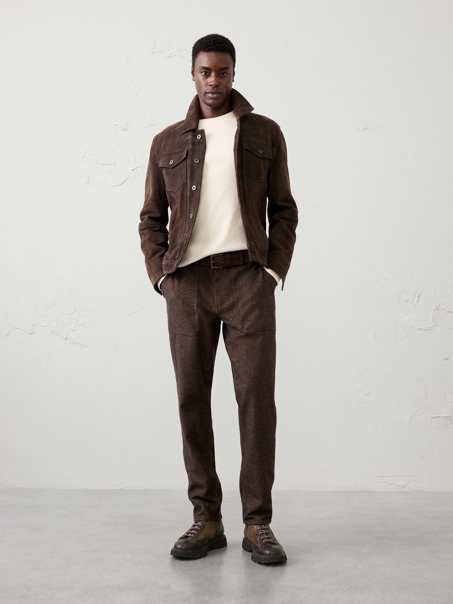 Image 1 of 6, Inspired by classic utility styling, this textured pant adds subtle visual depth while maintaining a soft, comfortable feel. Cut in our Athletic Fit with extra room through the hip and thigh, it combines functional details with versatile everyday wearability., Button closure with zip fly. Belt loops., Contrast trim at front pocket openings., Angled front patch pockets., Back patch pockets., Vertical front seam detailing., Made exclusively for Banana Republic Factory., Product #1179691