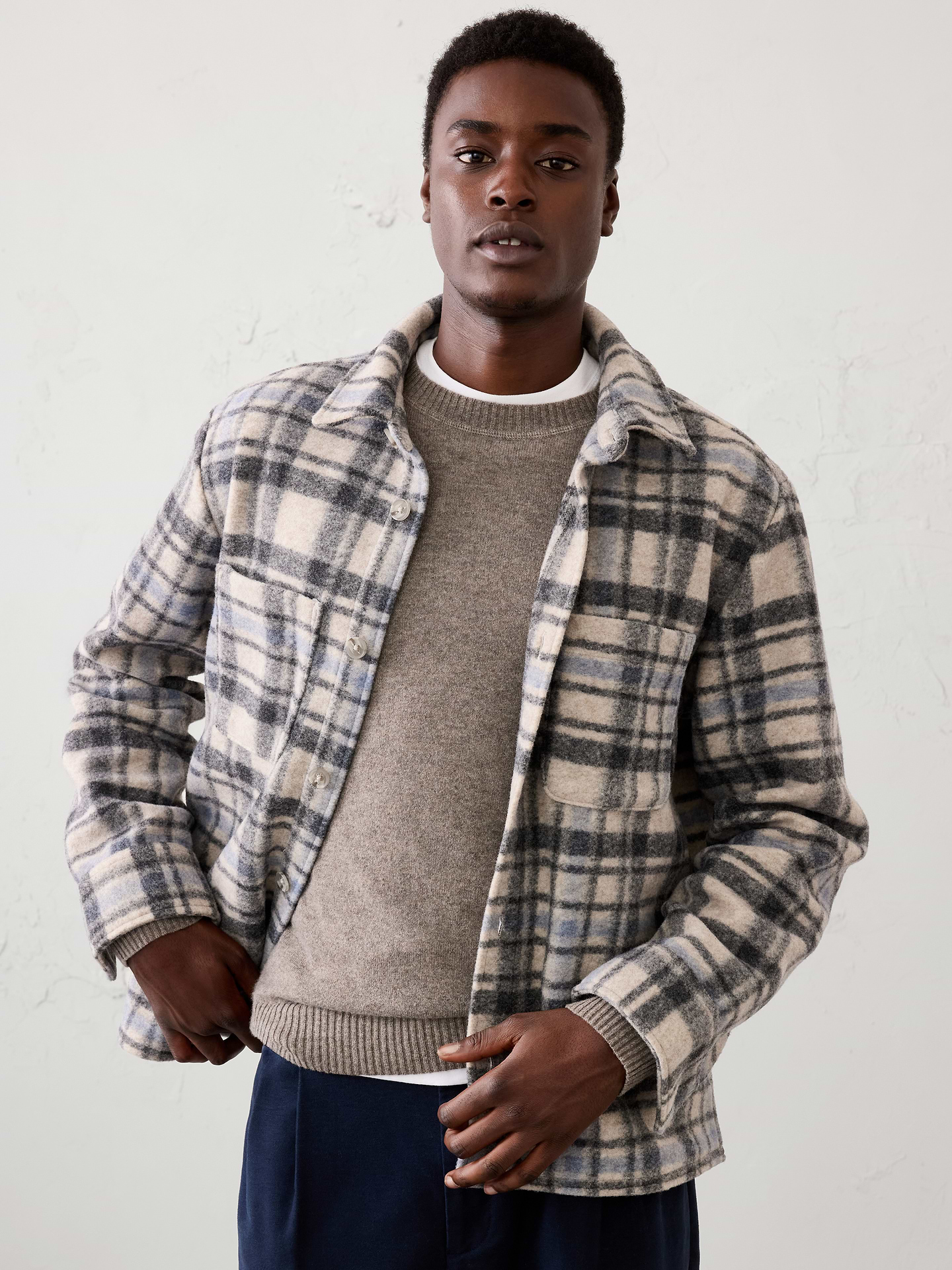 Image 1 of 8, Crafted from a soft brushed fabric for added coziness and comfort, this shirt jacket is designed in festive plaid patterns that feel perfect for the season., Point collar. Long sleeves with button cuffs., Button‑front closure., On-seam side pockets., Chest pockets., Side slits at hem., Made exclusively for Banana Republic Factory., Product #1181090