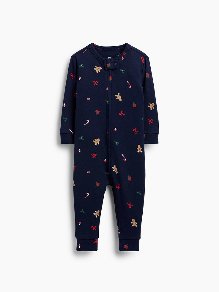 Image 1 of 3, Soft cotton jersey one-piece., Crewneck with snap tab to protect little chins., Long sleeves., Reversible two-way zipper for easy dressing and diapering., Banded cuffs., Allover print., Note: Foldover cuffs to prevent scratches on sizes up to 24M., Made with 100% organically grown cotton which is grown without the use of synthetic pesticides and fertilizers., Shop matching PJs for all., This product was made in a factory that invests in gender equity and women’s empowerment through RISE. Learn more at gapinc.com/equity ., Product #915914