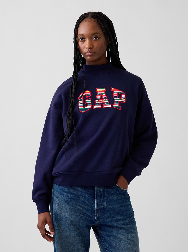 Image 1 of 5, Soft cotton-blend fleece sweatshirt. In an ultra oversized fit and longer length., Mockneck., Long sleeves with drop shoulders., Gap Original logo with Happy Stripe design., Banded rib cuffs and hem., Product #1201981
