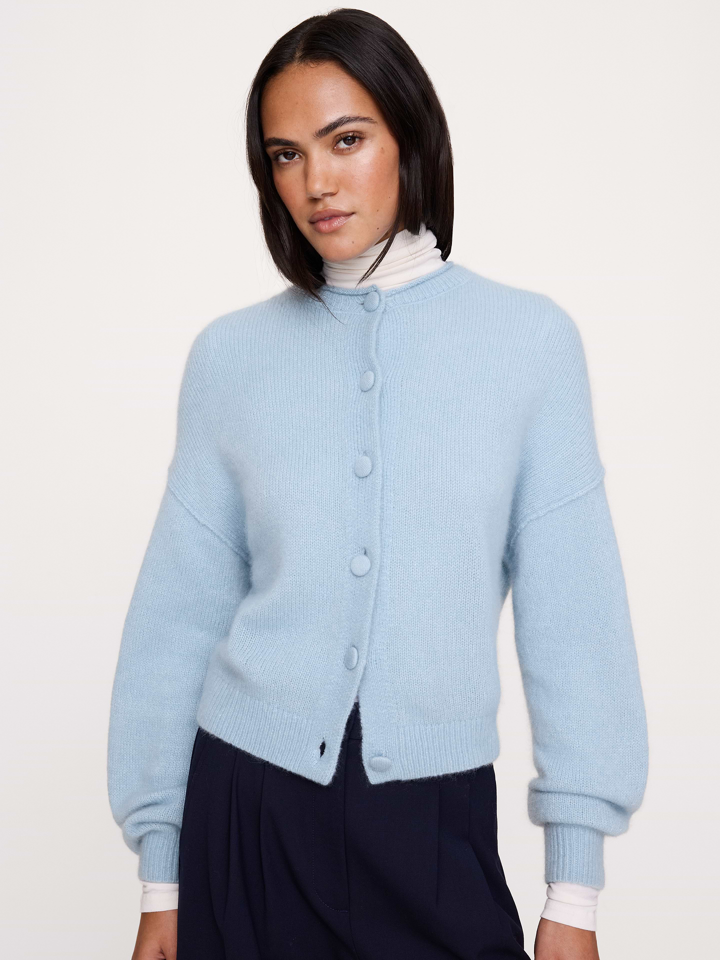 Image 1 of 3, Best of both worlds. This roll-neck cardigan uses a beautiful yarn spun from lightweight cashmere and silk, producing an ultra soft effect., Oversized Fit: Extra room through chest, shoulders, and waist. Dropped shoulder seam., Roll neck with button closure., Straight hem., Product #1192297