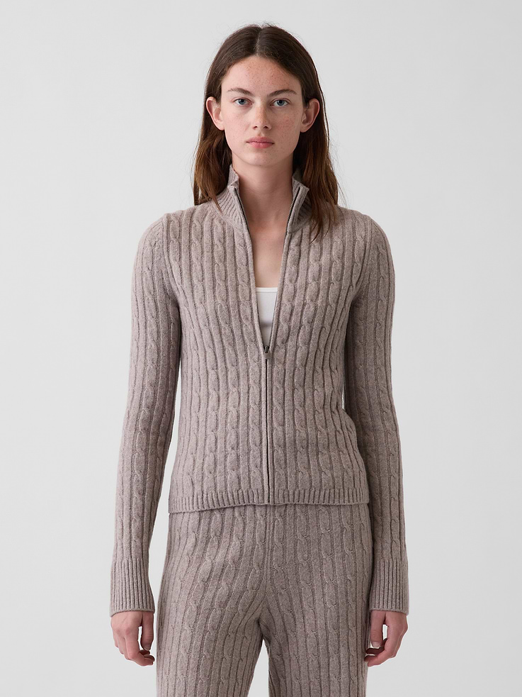 Image 1 of 5, Supersoft cable-knit cotton-blend zip cardigan., Mockneck, zipper front., Long sleeves., Ribbed cuffs and hem., This product was made in a factory that invests in gender equity and women’s empowerment through RISE. Learn more at gapinc.com/equity ., Product #1186083