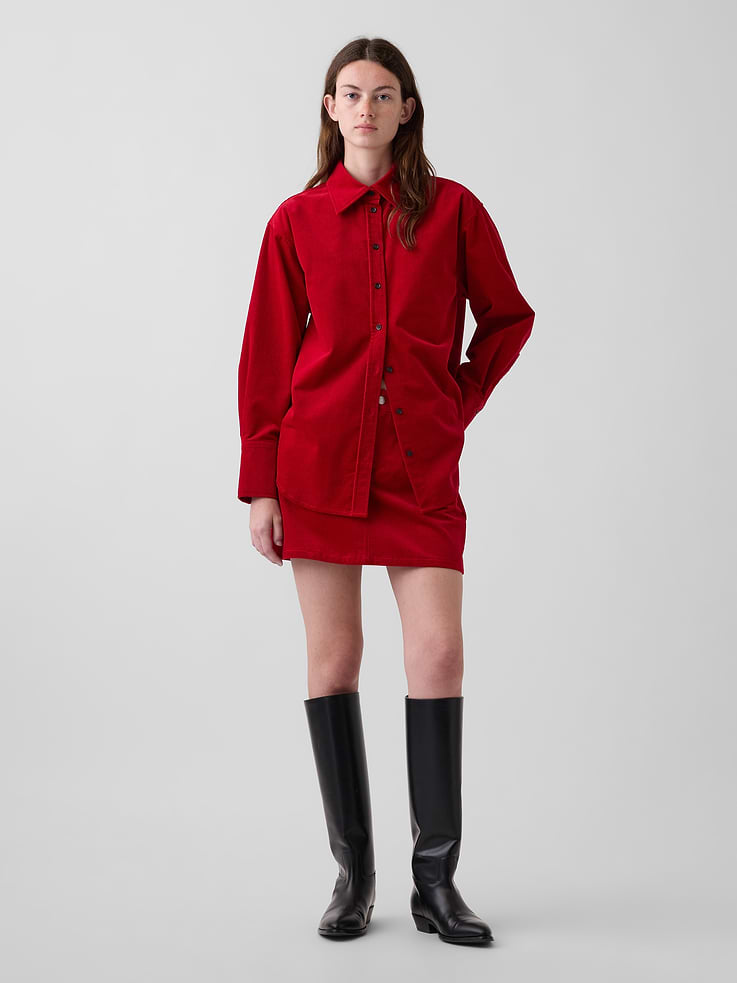Image 1 of 6, Soft, stretch cotton corduroy mini skirt., Button closure, zip fly., Classic five-pocket styling., This product was made in a factory that invests in gender equity and women’s empowerment through RISE. Learn more at gapinc.com/equity ., Product #1184726