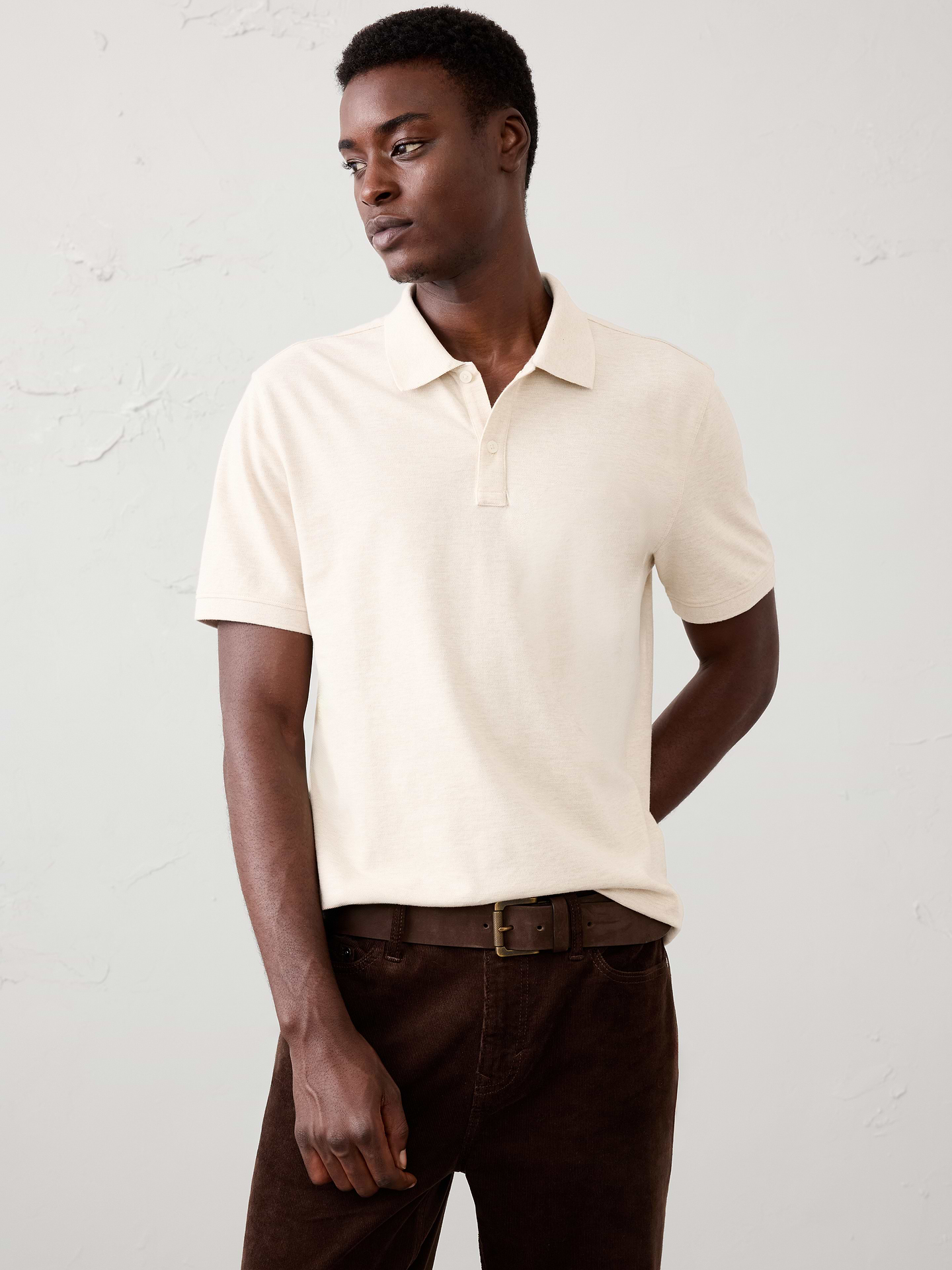 Image 1 of 8, Polo collar with button placket. Short sleeves., Embroidered monogram on chest., Straight hem with side vents., Made exclusively for Banana Republic Factory., Product #719664
