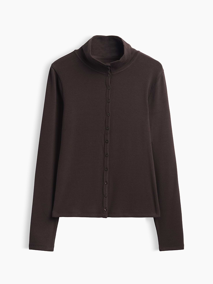 Image 1 of 2, Soft, ribbed stretch knit cardigan., Mockneck., Long sleeves., Button front., This product was made in a factory that invests in gender equity and women’s empowerment through RISE. Learn more at gapinc.com/equity ., Product #1195086