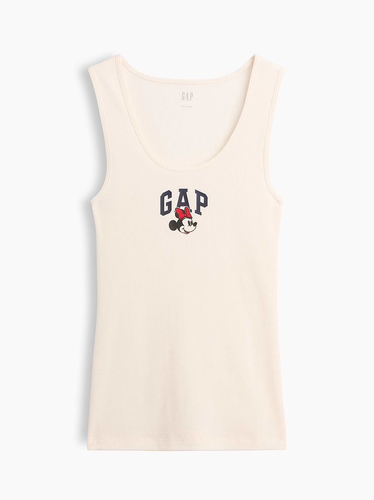 Image 1 of 2, A very special collaboration between Gap and Disney— two timeless, iconic American brands— led us to create a collection that celebrates Mickey Mouse and Minnie Mouse., Soft ribbed sleep tank., Tank straps., Scoopneck., Gap logo with Minnie Mouse graphic at front., This product was made in a factory that invests in gender equity and women’s empowerment through RISE. Learn more at, Product #1187667