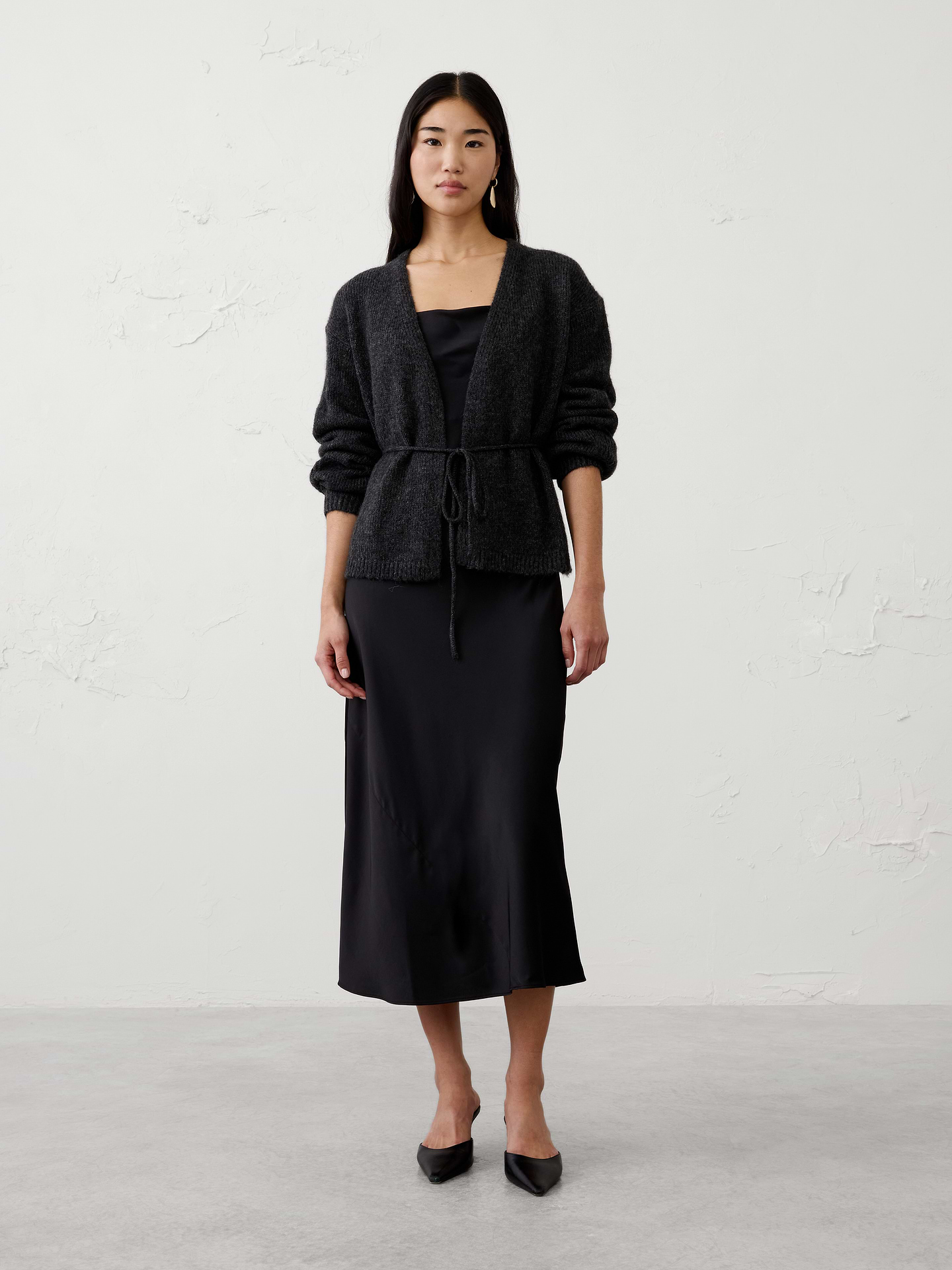 Image 1 of 4, Wrap yourself in plush comfort with this open-front cardigan, crafted from a brushed yarn that feels exceptionally soft and cozy against the skin. The fuzzy texture creates a rich, dimensional look while remaining lightweight enough for effortless layering., Open-front silhouette with self-tie belt at waist. Long sleeves., Ribbed arm cuffs and hem., Made exclusively for Banana Republic Factory., Product #1178532