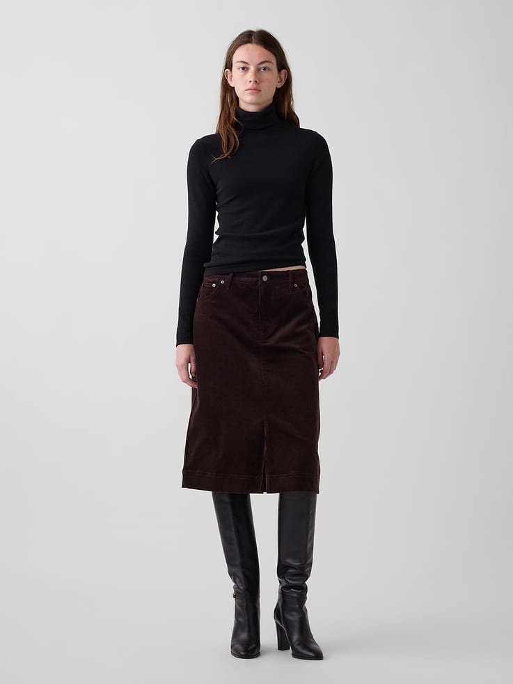 Image 1 of 5, Soft, stretch cotton corduroy knee-length skirt., Button closure, zip fly., Classic five-pocket styling., Front slit., This product was made in a factory that invests in gender equity and women’s empowerment through RISE. Learn more at gapinc.com/equity ., Product #1184720
