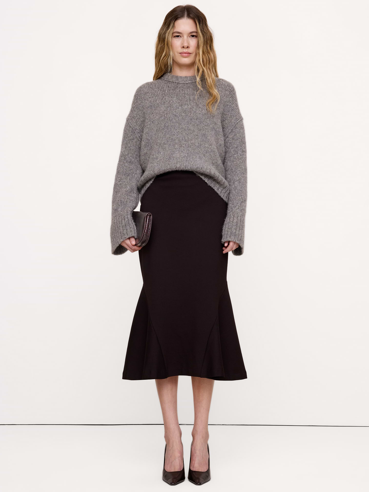 Image 1 of 3, A fishtail midi skirt cut from a high-stretch ponte, with strategically seamed panels to accentuate your shape., A-Line fit: High rise. Fitted waist with a flare silhouette., Elastic waistband (pull-on design)., Lined., Product #1182120