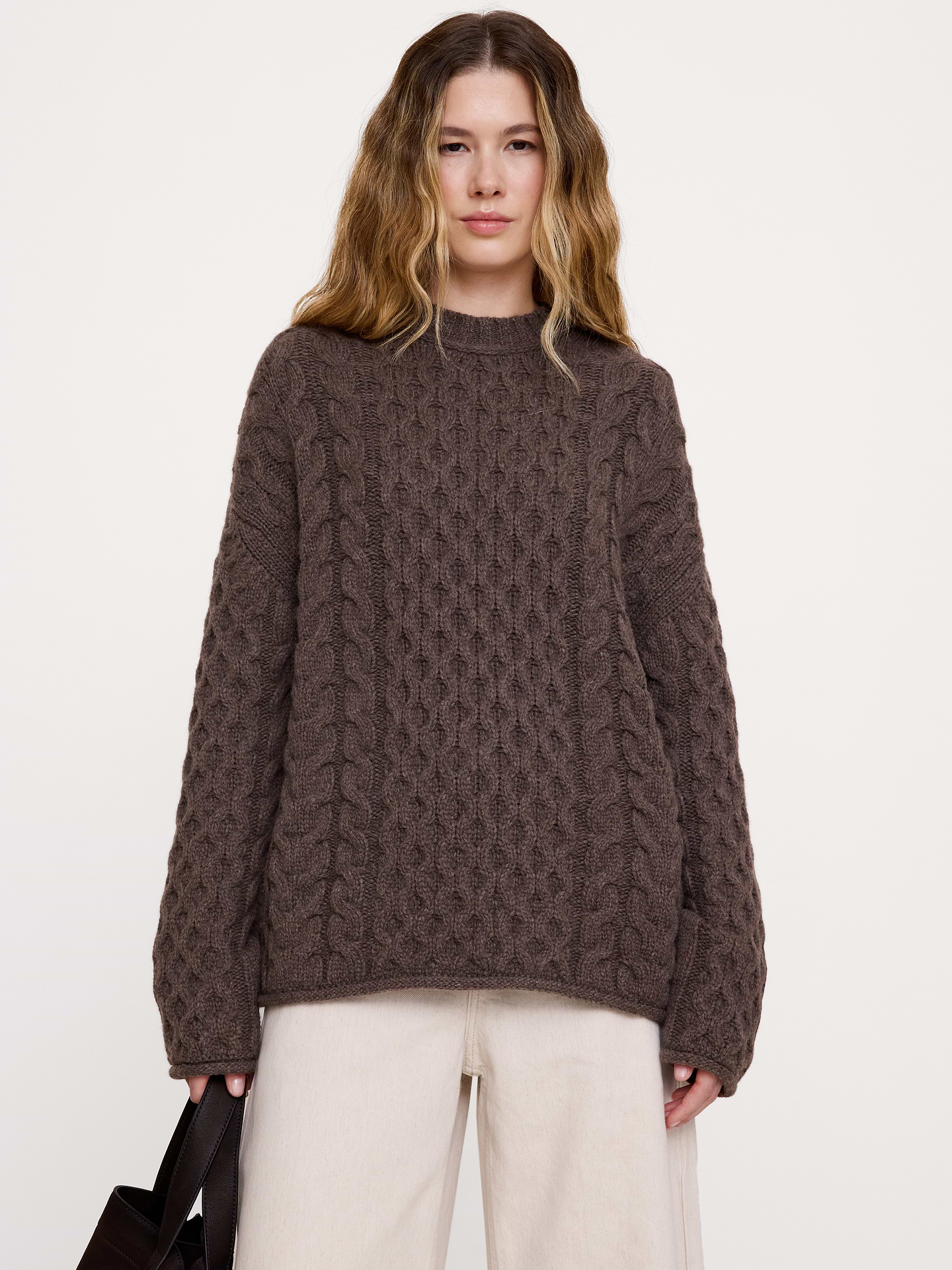 Image 1 of 3, A fresh take on the classic cable-knit sweater, we used a mix of cables and honeycomb stitches in our favorite Italian Merino-wool blend, in a longer tunic length so it's ultra-cozy., Ultra-Oversized Fit: Lots of room through chest, shoulders, and waist. Dropped shoulder seam., Fabric from Italy's Filpucci mill., Crew neck., Straight hem., Product #1184628